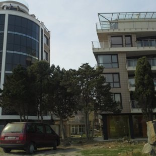 The neighboring building.