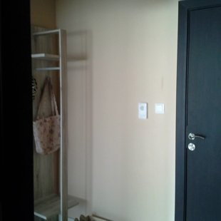 There is an intercom system and sensor lighting in the building