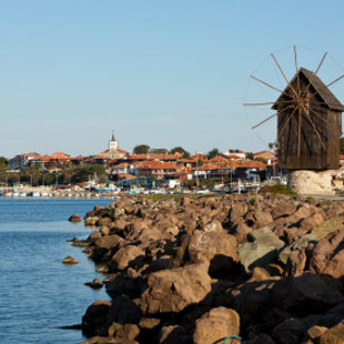 The wooden windmill on the isthmus that connects the town to the mainland