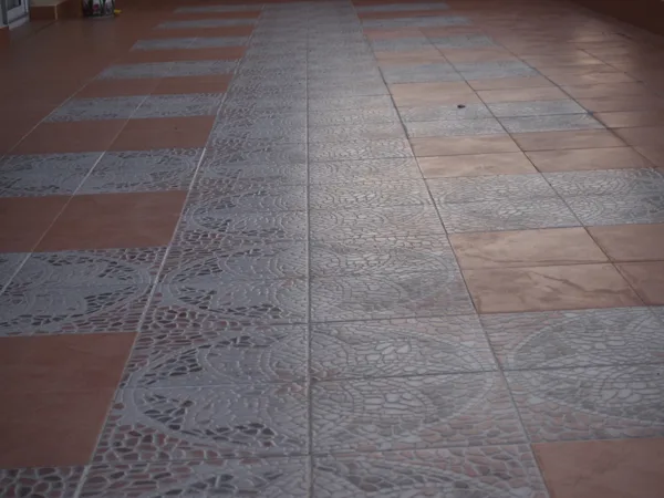 The north terrace is covered with Italian terracota and opens to the kitchen and the hallw