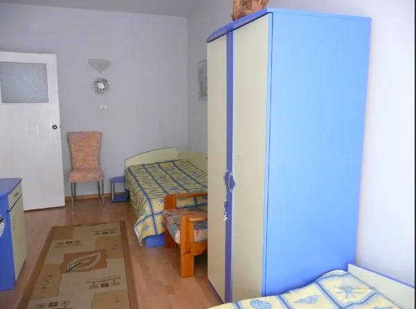 There are two twin beds in the second bedroom