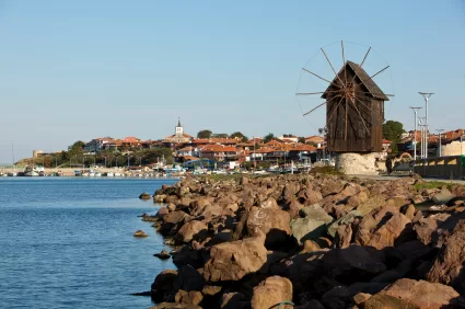 The wooden windmill on the isthmus that connects the town to the mainland